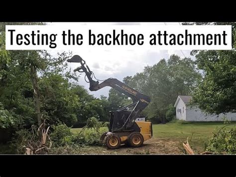 taking down trees with bobcat skid steer|skid steer attachment for tree removal.